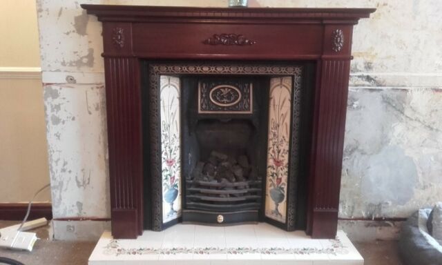 Fireplace with Mahogany surround mantlepiece gad fire and Bictorian style tiled hearth and backing in Ashton in Makerfield Manchester $ 58 JPG