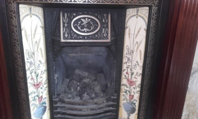 Fireplace with Mahogany surround mantlepiece gad fire and Bictorian style tiled hearth and backing in Ashton in Makerfield Manchester $ 58 JPG