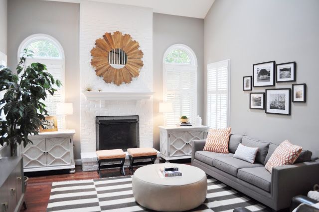 White Painted Fireplace Luxury Family Room with Grey Walls A Grey and White Striped Rug A