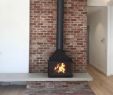 Architectural Fireplaces Elegant Red Bricks and Concrete are the Perfect Backdrop to A Cast