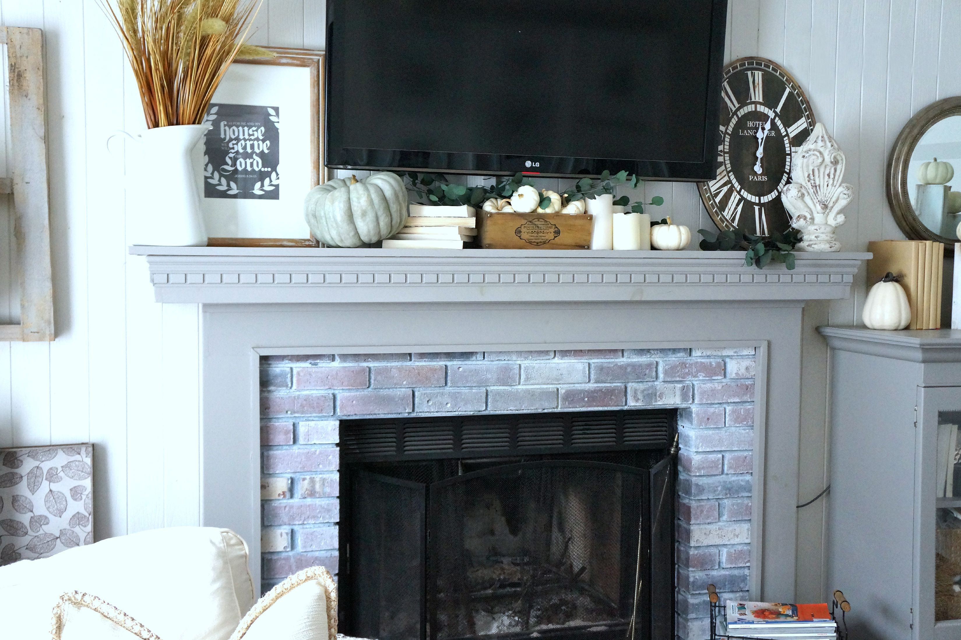 decorate fall mantel around TV a5f9b582c356d1f7b