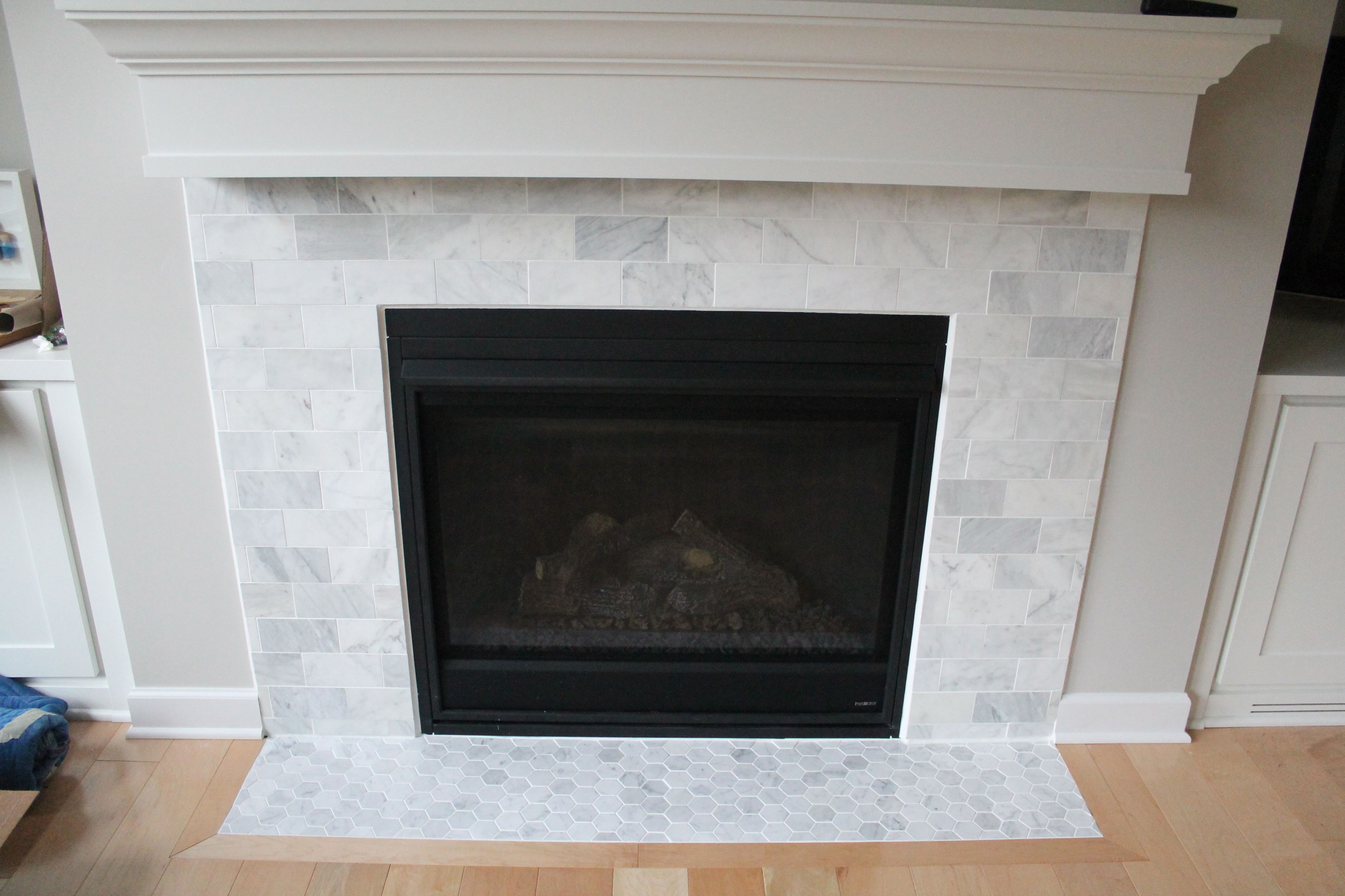 1 fin marble subway tile fireplace 5a0c9fa2482c b0a8