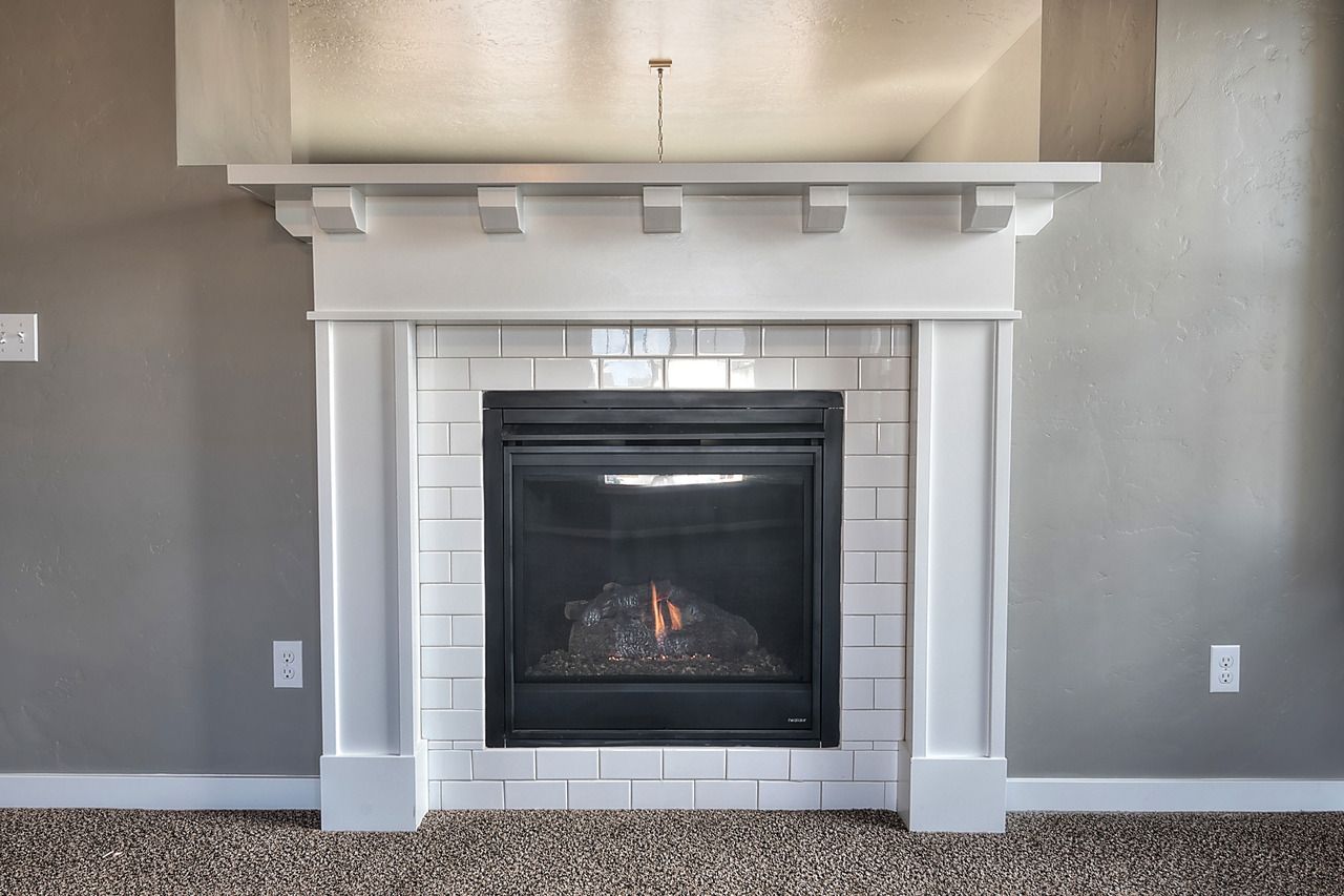 Big Lots Gas Fireplace New Cozy Up to This Fireplace Surrounded with White Subway Tile