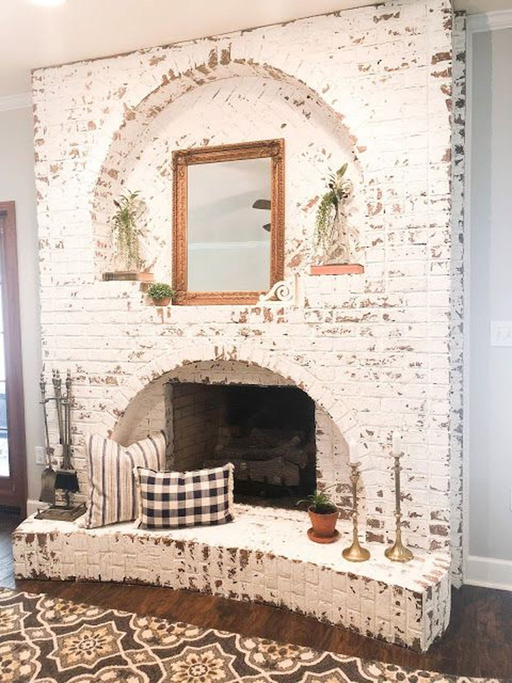 Stencil over black tile just to jazz up the fireplace Rustic Brick Fireplace Living Rooms Decorations Ideas19