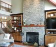 Built In Cabinets Around Fireplace Plans Lovely Stone Fireplace Surrounded by Built In Bookshelves Creates A