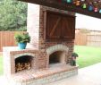 Built In Outdoor Fireplace Awesome Custom Made Brick Fireplace with A Firewood Holder and Tv