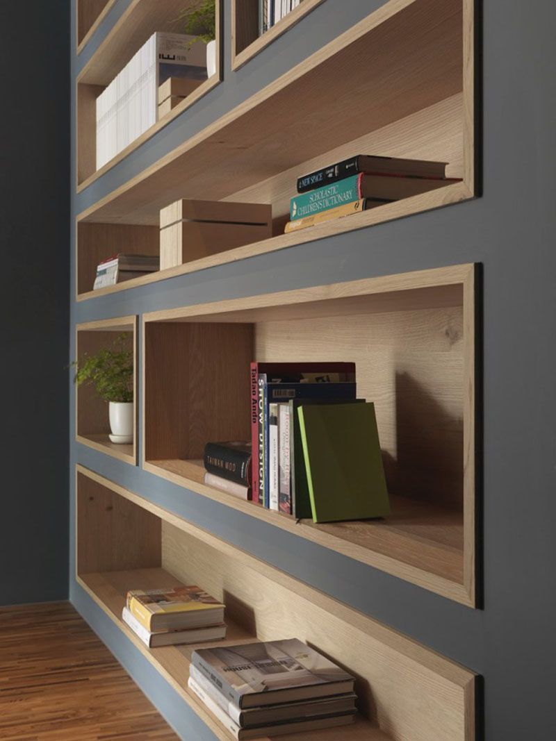 Built In Shelves Around Fireplace Awesome Built In Bookshelves Lined with Wood Highlight the Displayed