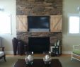 Can You Mount A Tv On A Brick Fireplace Unique Hidden Tv Over Fireplace Open Doors Decor and Design