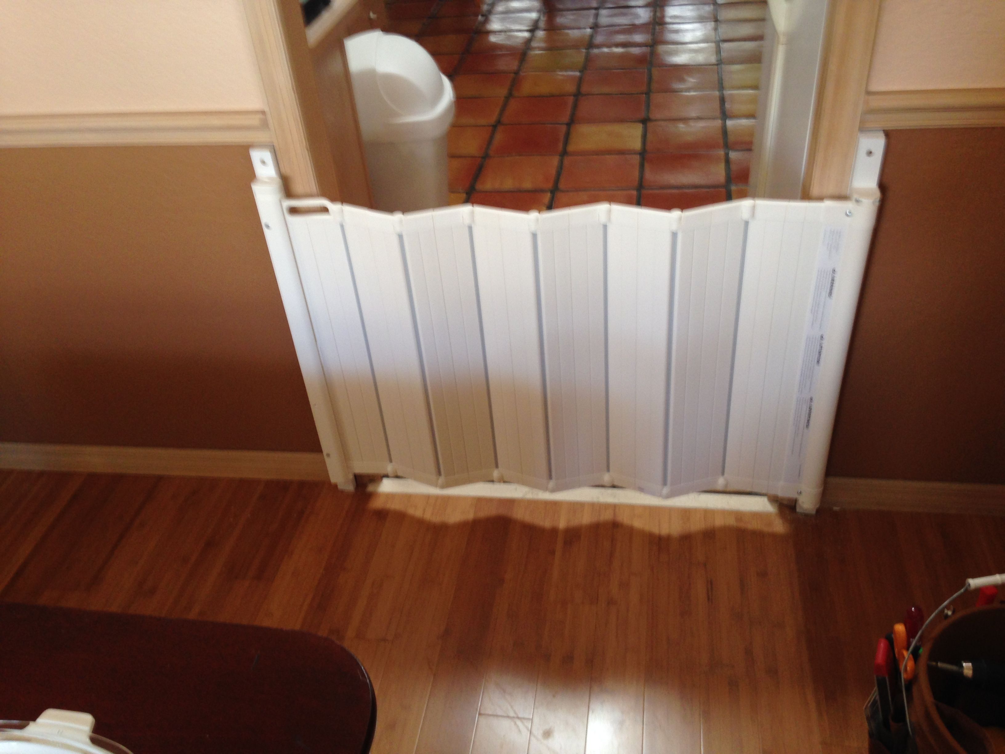 Fold away baby gate This new gate folds to the wall when 6afb0d06b2e495c fad1e03c74f8