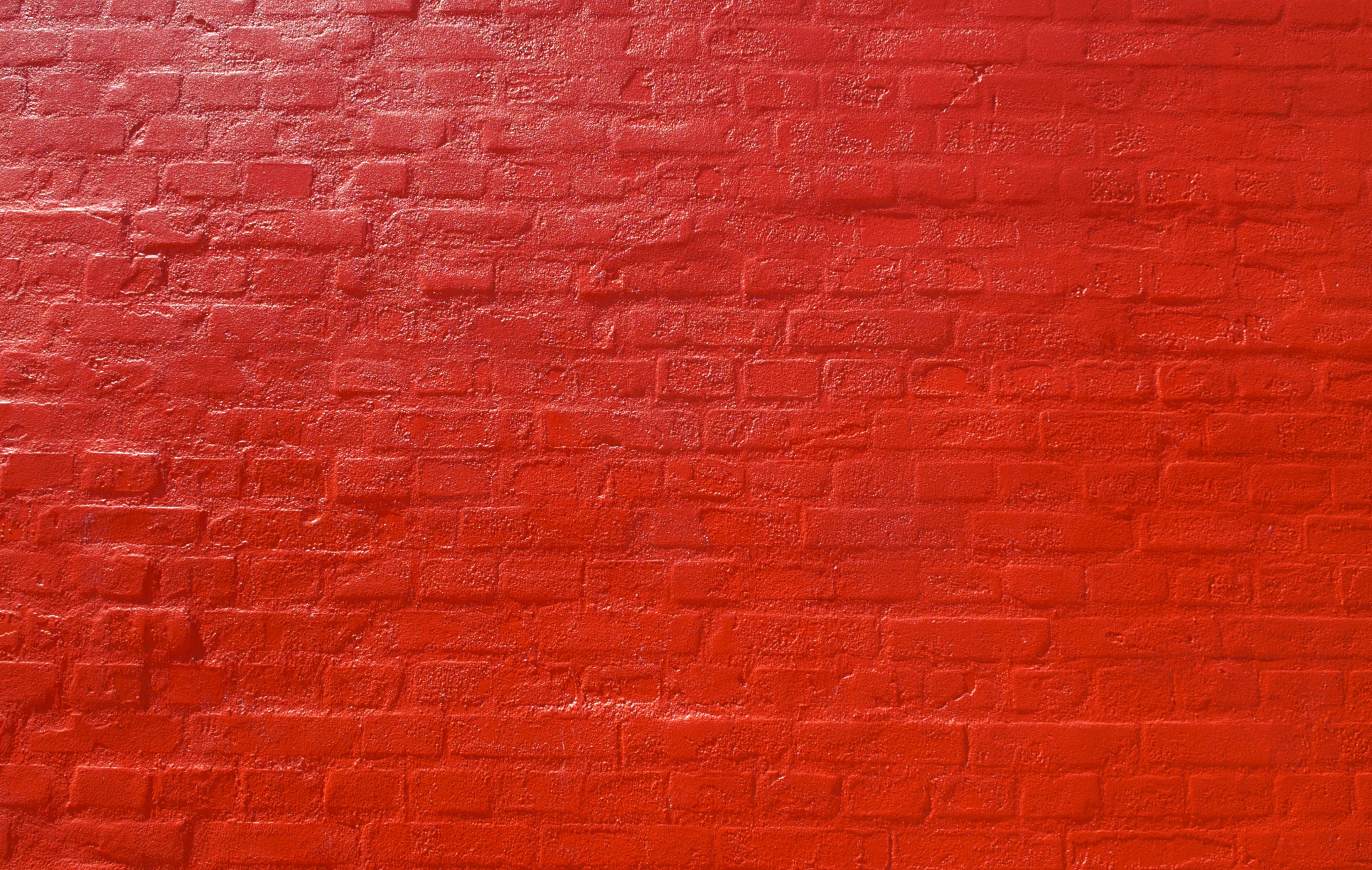 Помню кирпично красный покрытый. Красная кирпичная стена. Красный кирпич текстура. Фон красный кирпич. Кирпично-красный цвет.
