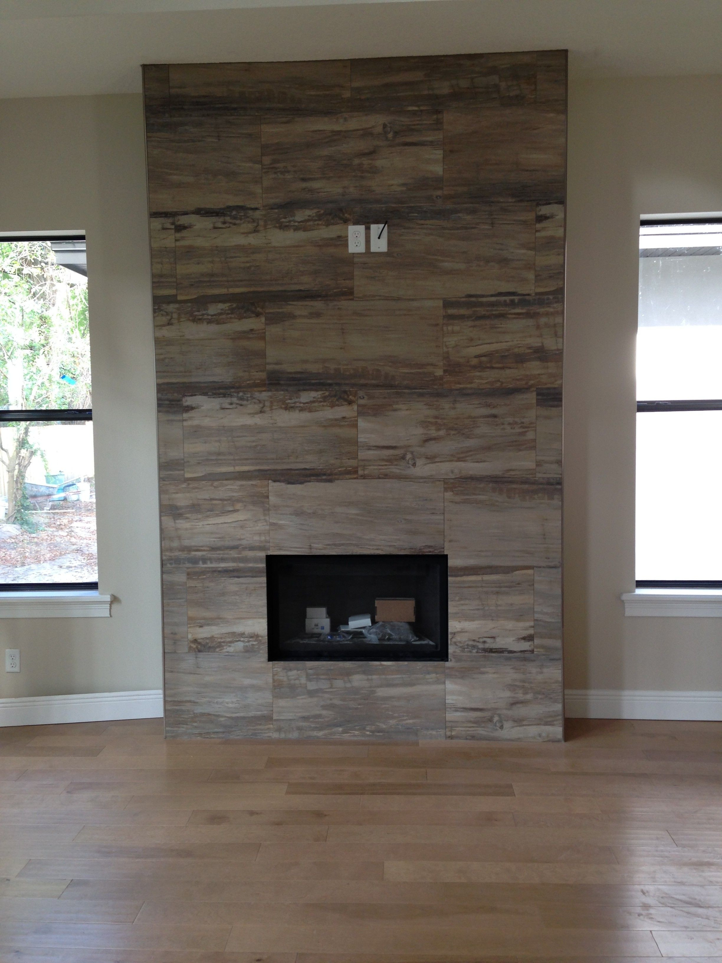 hardwood floors around brick fireplace hearths of j wood tile makes an absolutely stunning fireplace inspiration with j wood tile makes an absolutely stunning fireplace