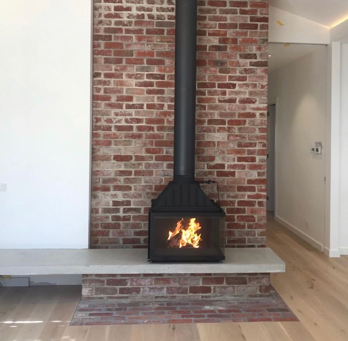 Concrete Tile Fireplace Awesome Red Bricks and Concrete are the Perfect Backdrop to A Cast