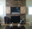 Cover Brick Fireplace with Wood Panels Awesome Hidden Tv Over Fireplace Open Doors Decor and Design