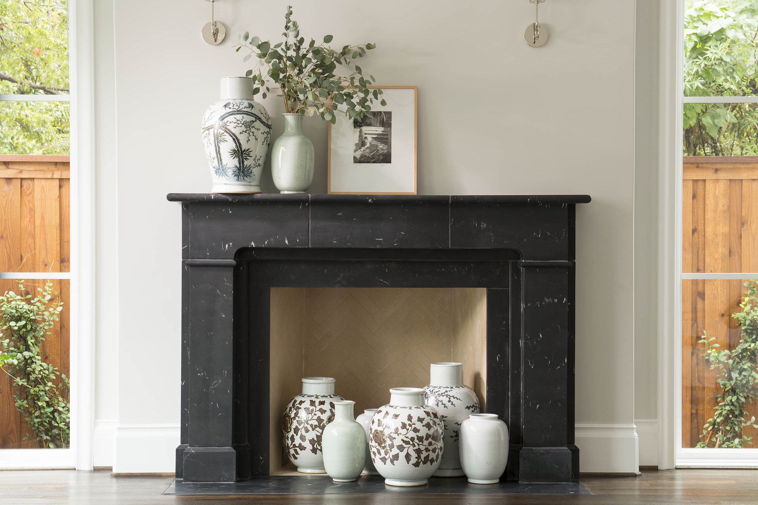 18 Stylish Mantel Ideas for Your Decorating Inspiration 12 fin black marble fireplace 5a0c9e069e b5