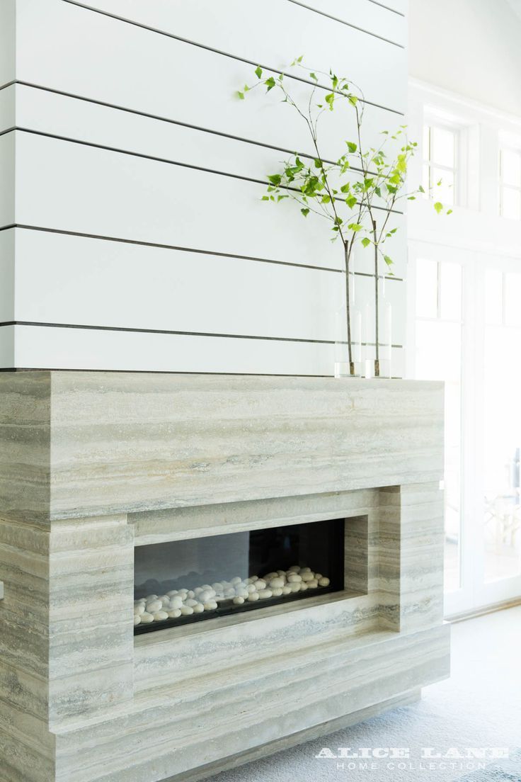 A simple contemporary fireplace in our Coastal Contemporary 590d67c6b74b55fdc5330ab f291