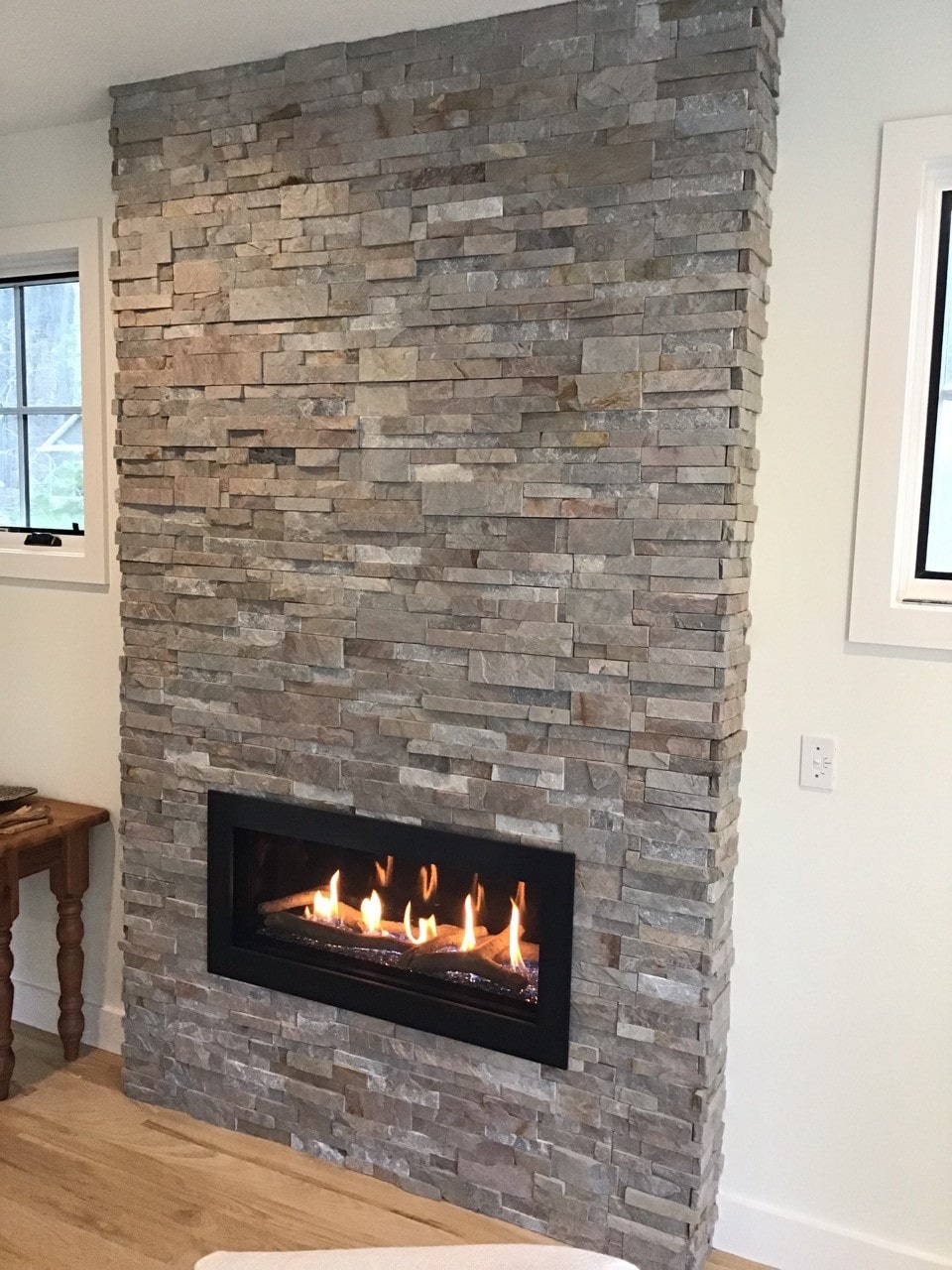 Sierra XLX Stacked Stone on Floor to Ceiling Fireplace