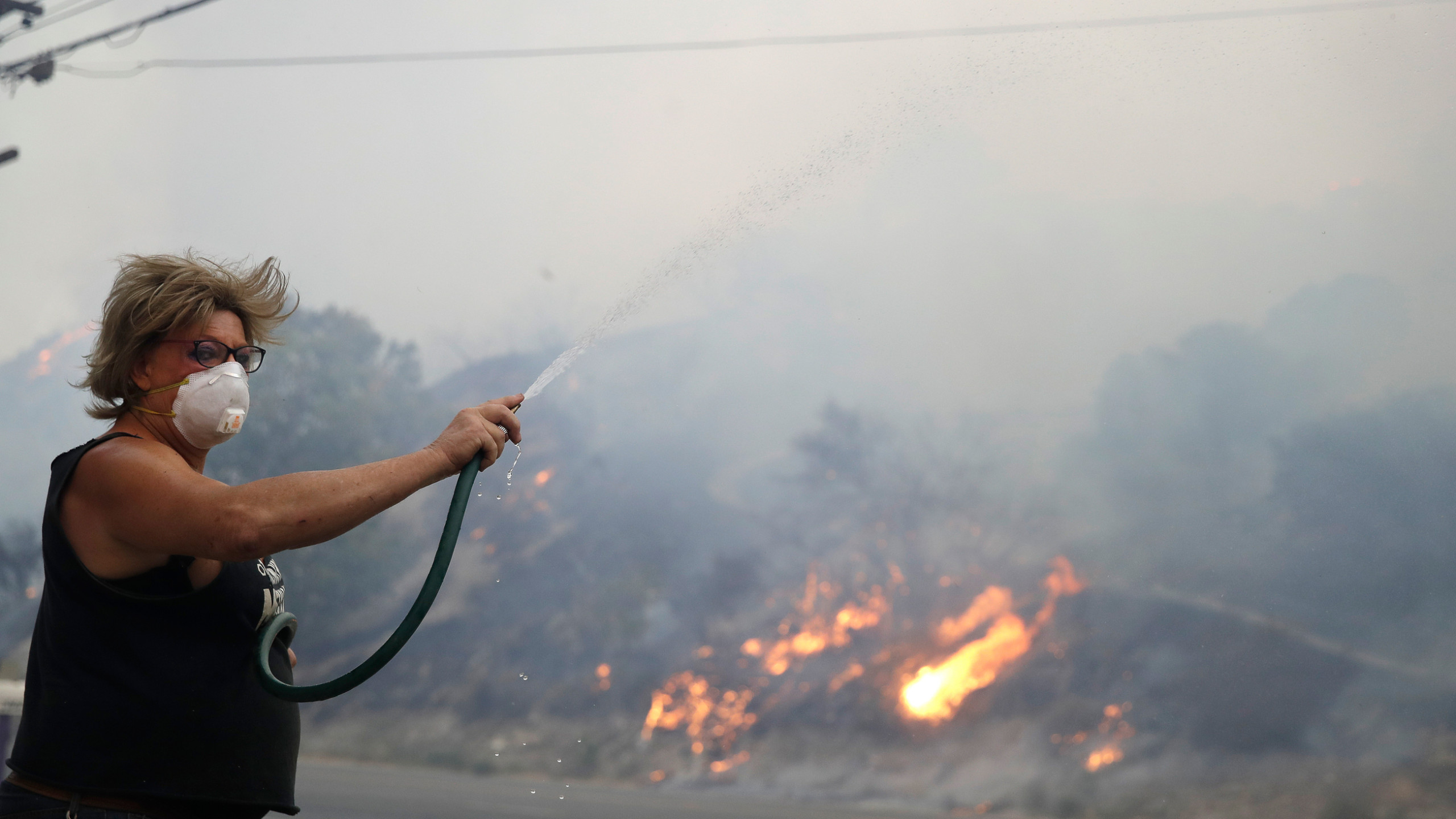 The Latest Fire near LA has damaged or destroyed homes a19d3988babf4f76b72d8b7fe7e28d8a
