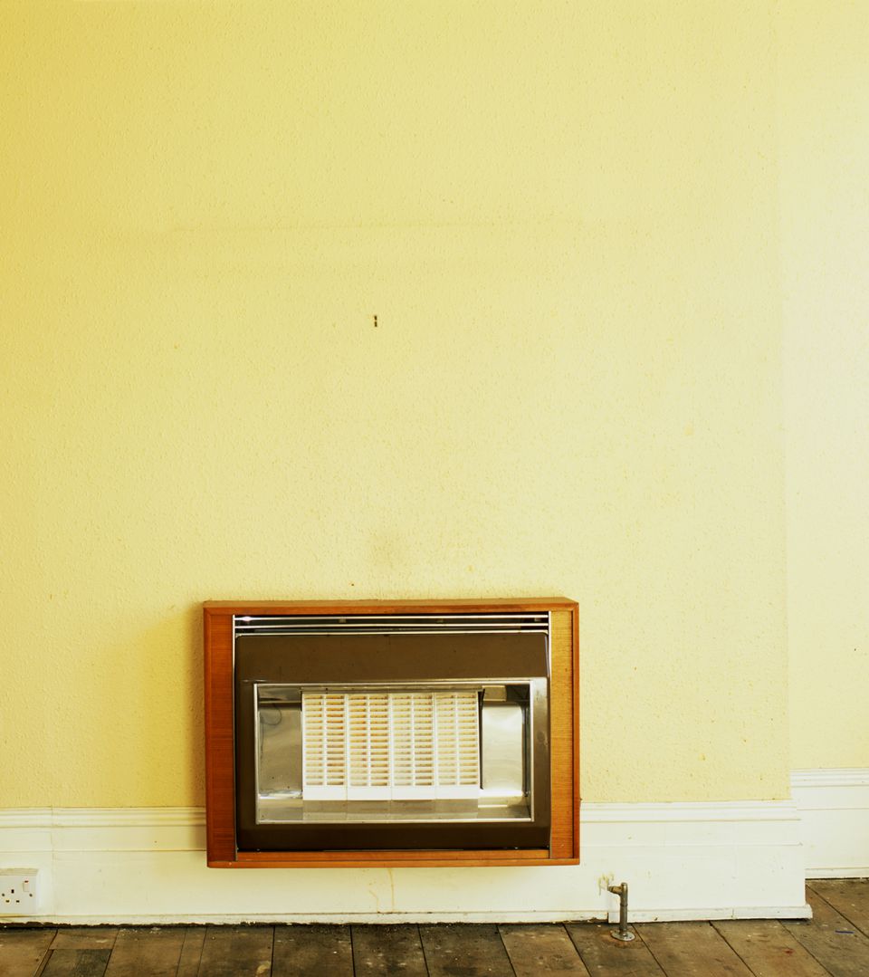 Electric Wall Heater Ticket to Warmth or Energy Vampire heater mounted on wall 001 57fbaf395f9b586c de
