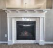 Fake Fireplace Mantel Kits Inspirational Cozy Up to This Fireplace Surrounded with White Subway Tile