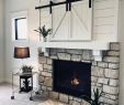 Farmhouse Fireplace Elegant White Painted Shiplap On A Fireplace with Secret Tv Storage