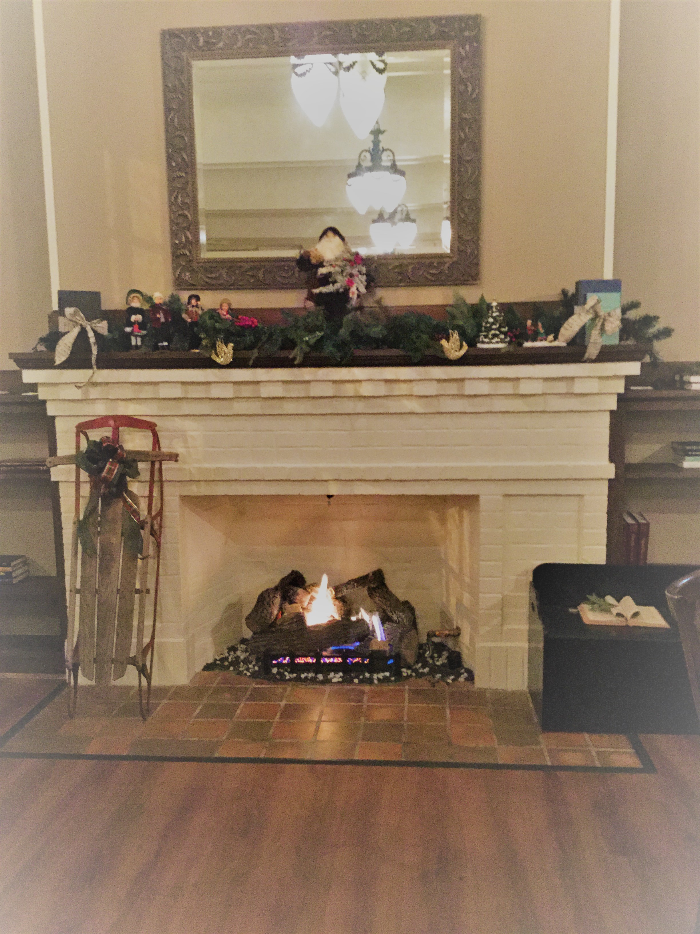 Wel e to the Library Wine Bar & Bistro fire place down
