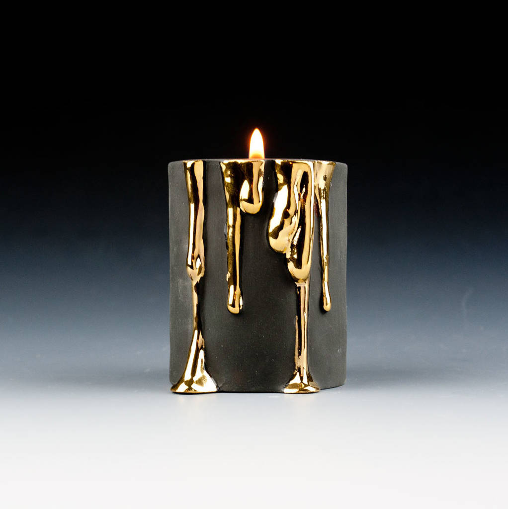 original black candle holders with dripping gols