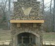 Fireplace Kit Elegant Fireplace with Cypress Wood Mantle and Custom Stone Plaque