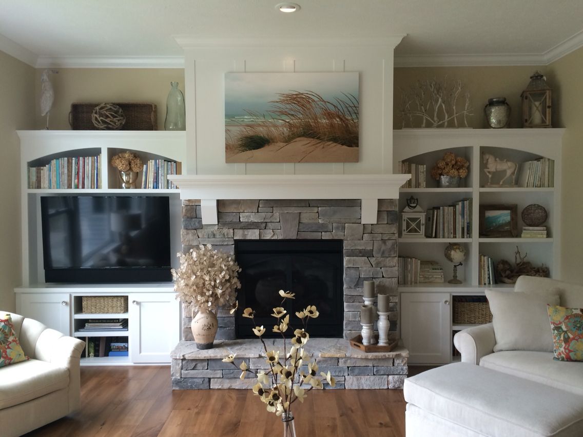 Gas fireplace with stacked stone pieced hearth corbels c660a3df5edd9b703bb64aaee527d741
