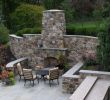 Fireplace Stone and Patio New Outdoor Fireplace Incorporated Into High Stone Wall with