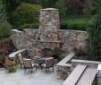 Fireplace Stone and Patio New Outdoor Fireplace Incorporated Into High Stone Wall with