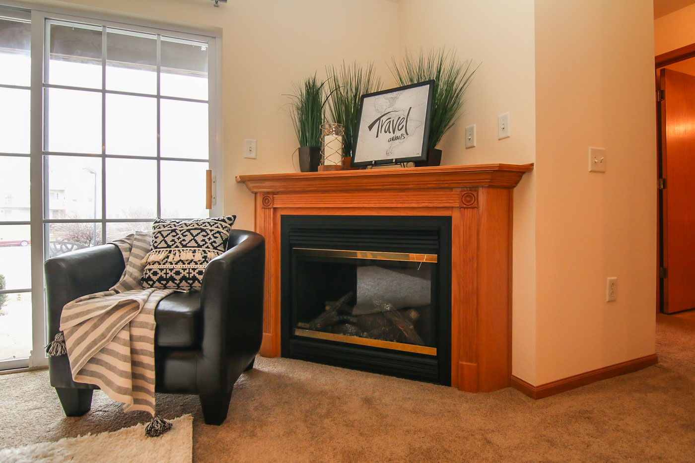 Regency Place RP Int 1bd Living Room with Fireplace Closeup 240dpi