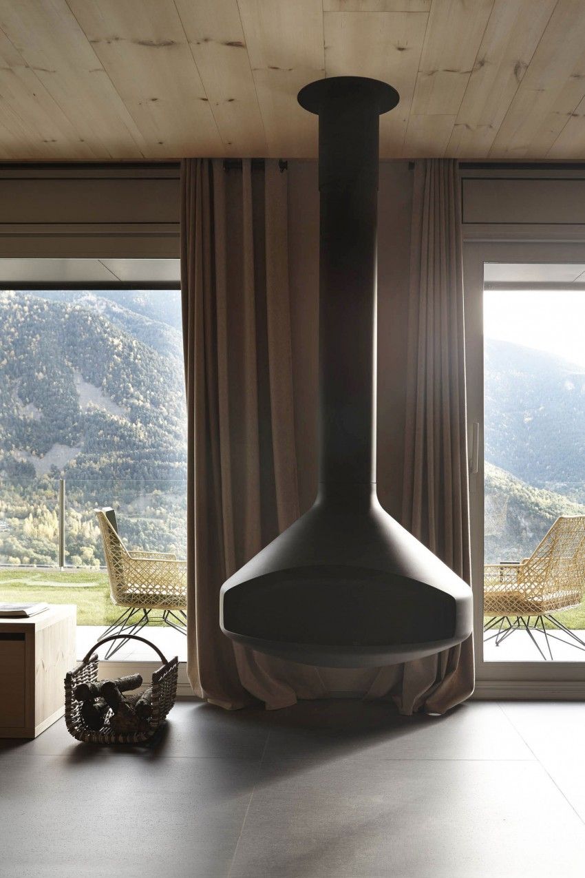 Contemporary home showcasing wood interiors in Andorra La b4500d1b29e0a64ecf9eea ba3