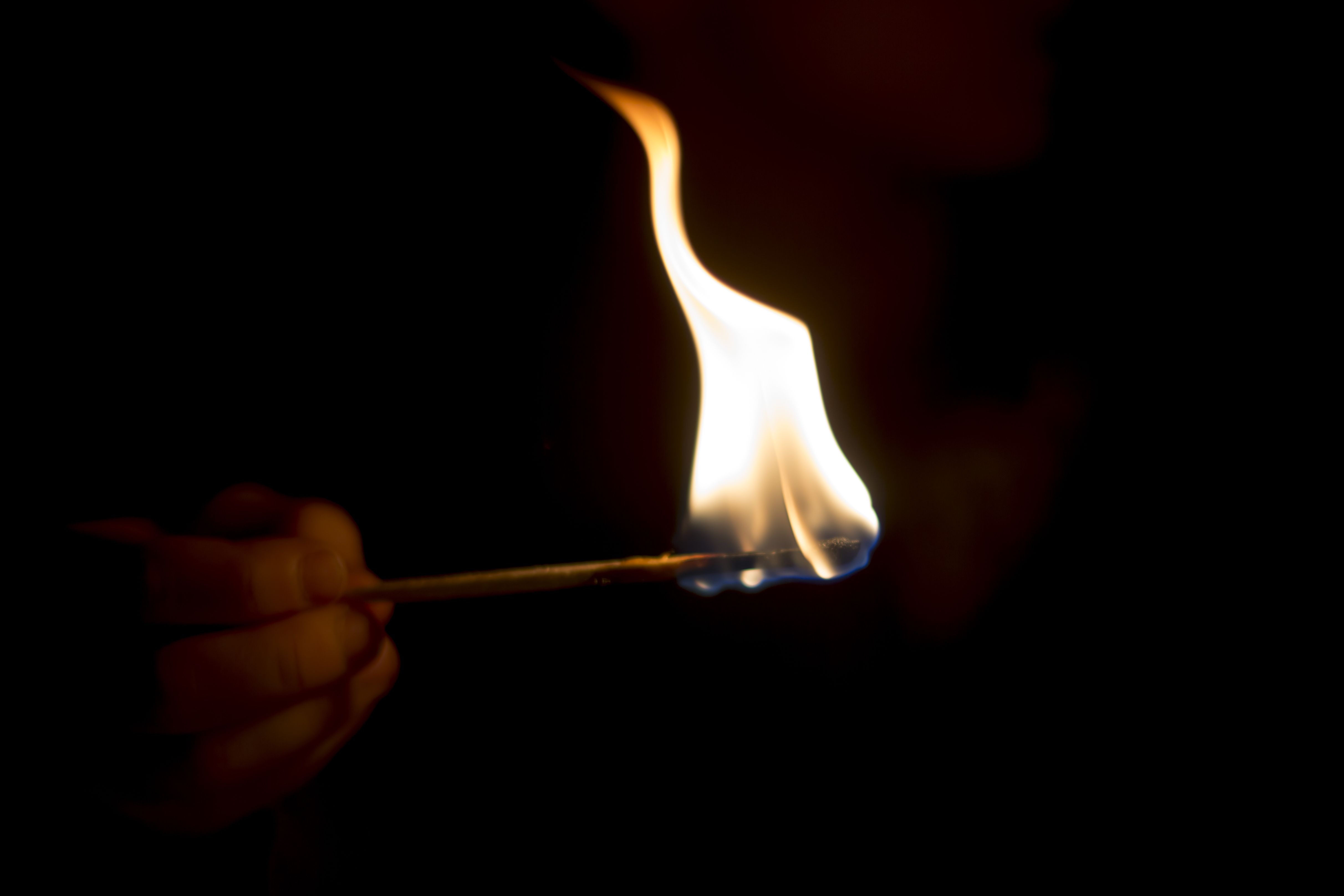 hand with burning matchstick 5703d7365f9b ae9da0
