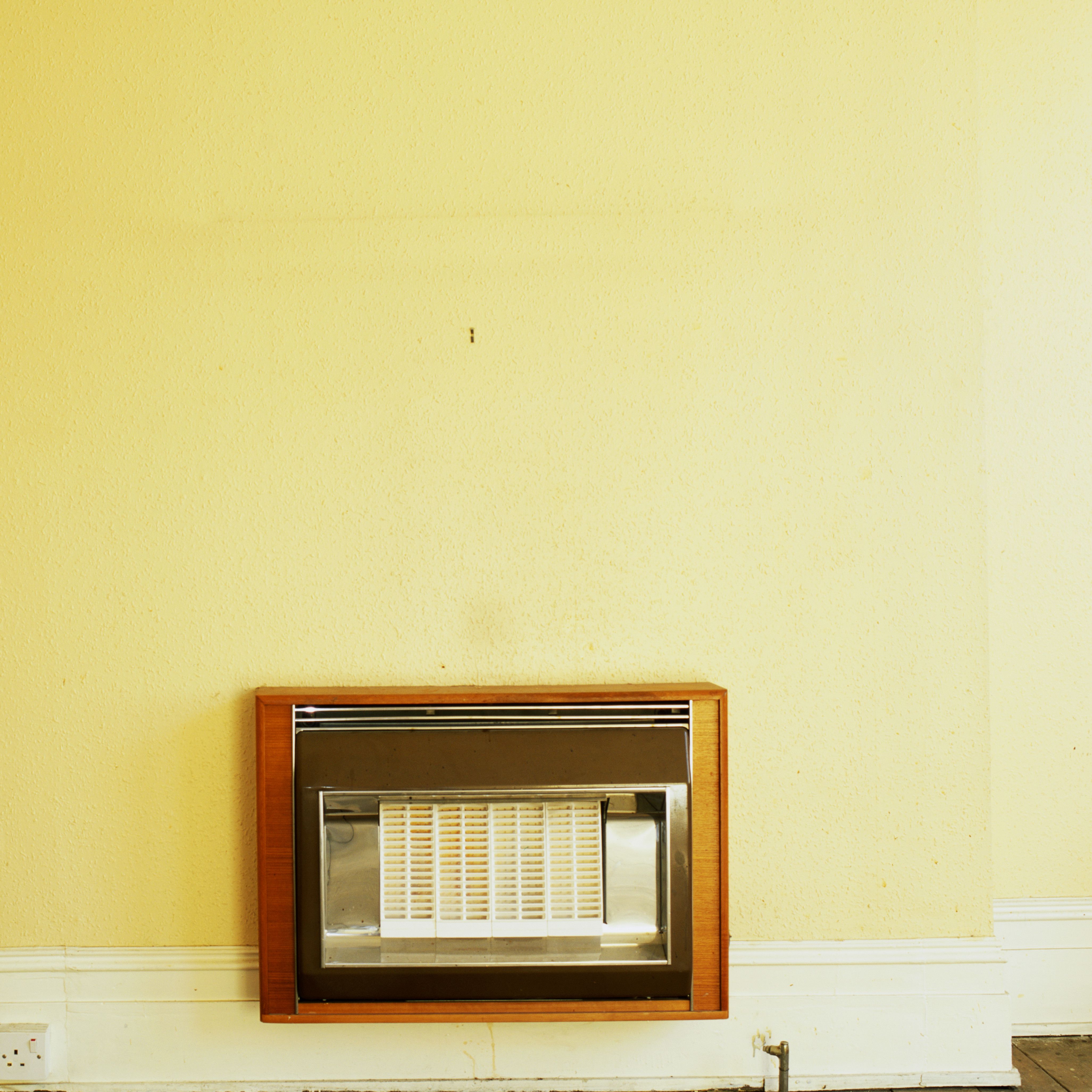 Electric Wall Heater Ticket to Warmth or Energy Vampire heater mounted on wall 001 57fbaf395f9b586c de