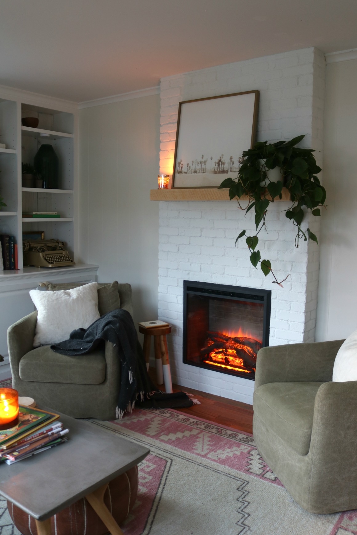 Fireplace Electric Brick Fireplace painted white Pure White Sherwin Williams Small family room 5