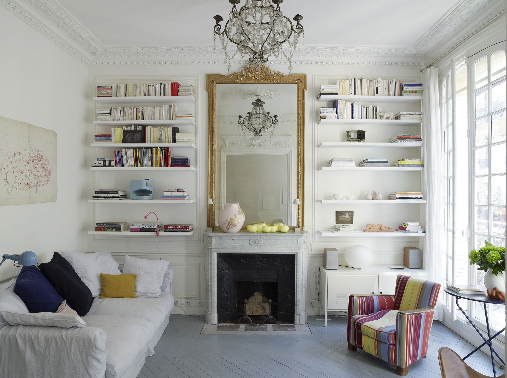How To Use Mirrors To Create Good Feng Shui Living room mirror Getty 58b8be143df78c353c14eae5