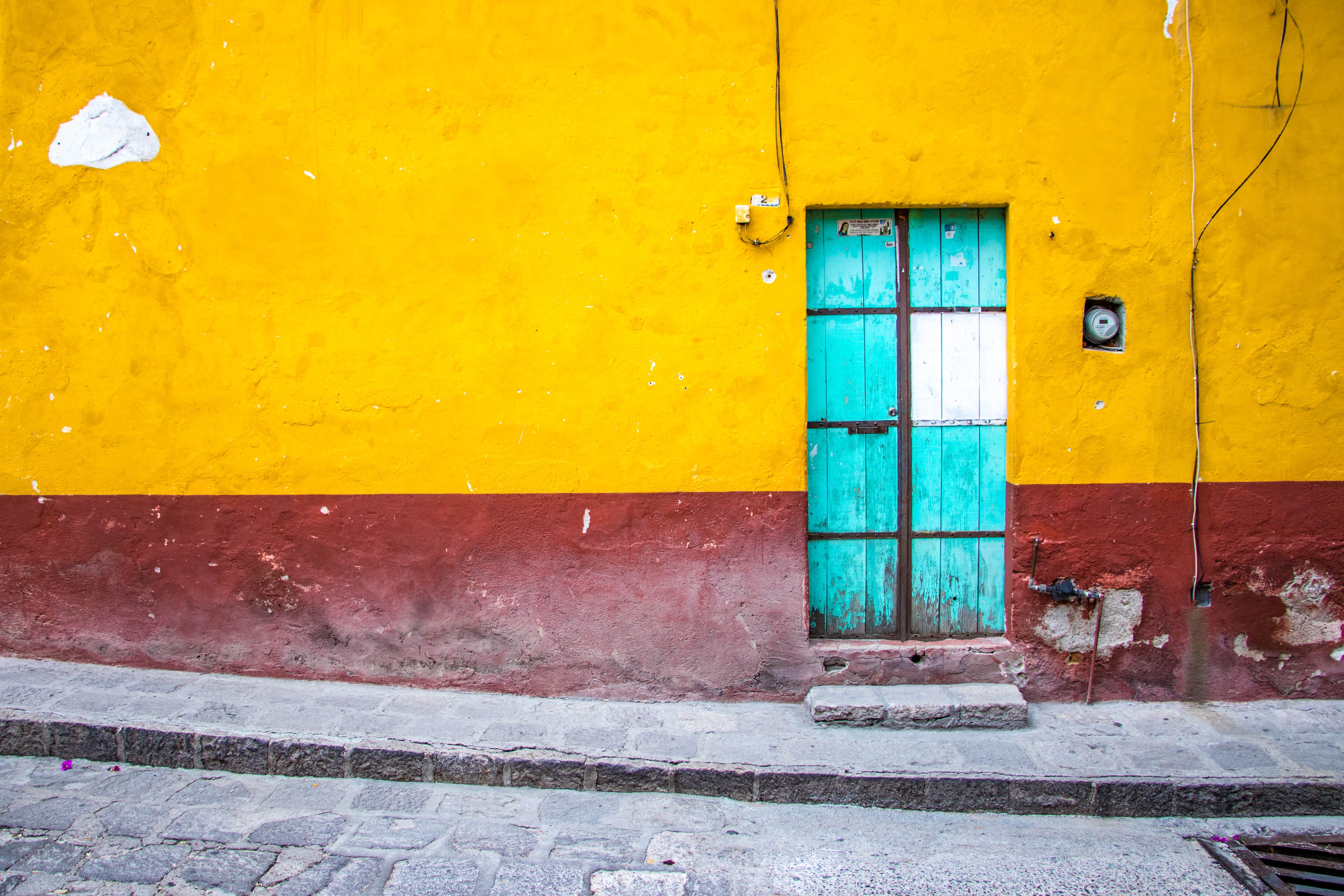 a blue door on a painted wall in san miguel de allende mexico 5c e0fb f17