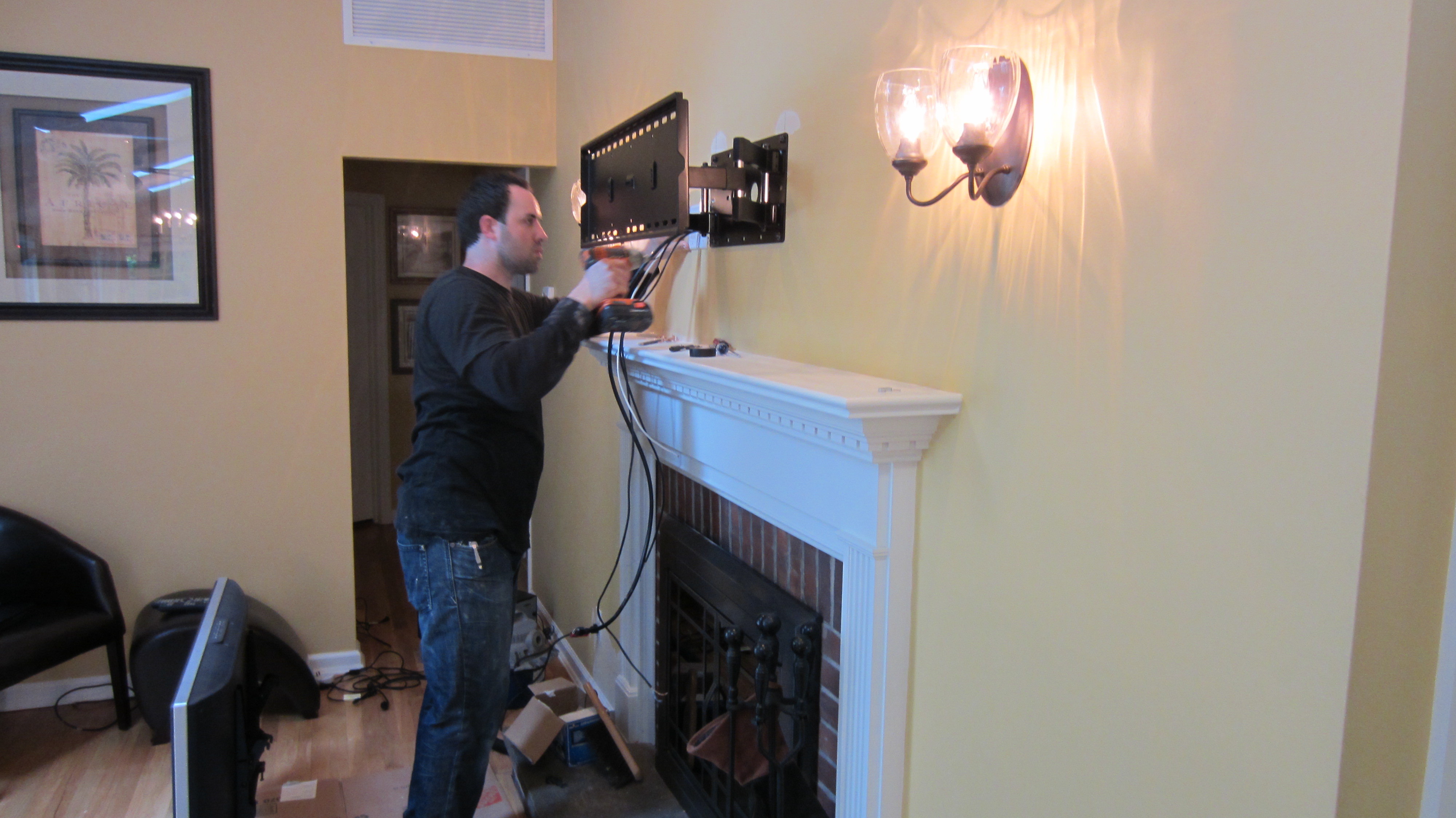 norwalk ct tv mounted over fireplace with all wires concealed img 1101