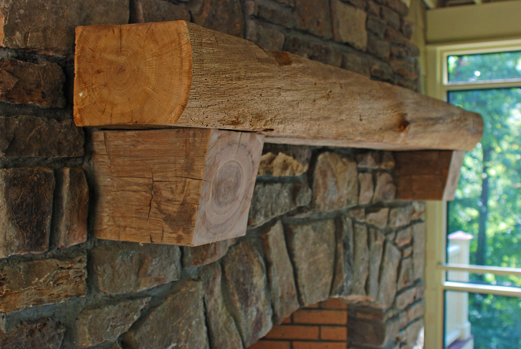 rustic live edge fireplace mantel with end grain corbels 1