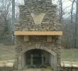 Outside Brick Fireplace Elegant Fireplace with Cypress Wood Mantle and Custom Stone Plaque