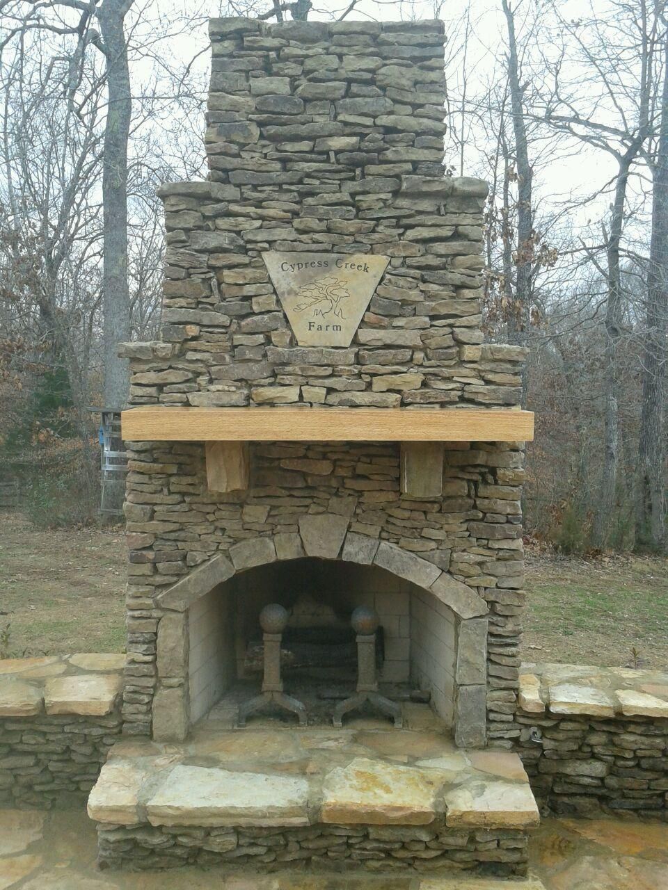 Outside Brick Fireplace Elegant Fireplace with Cypress Wood Mantle and Custom Stone Plaque