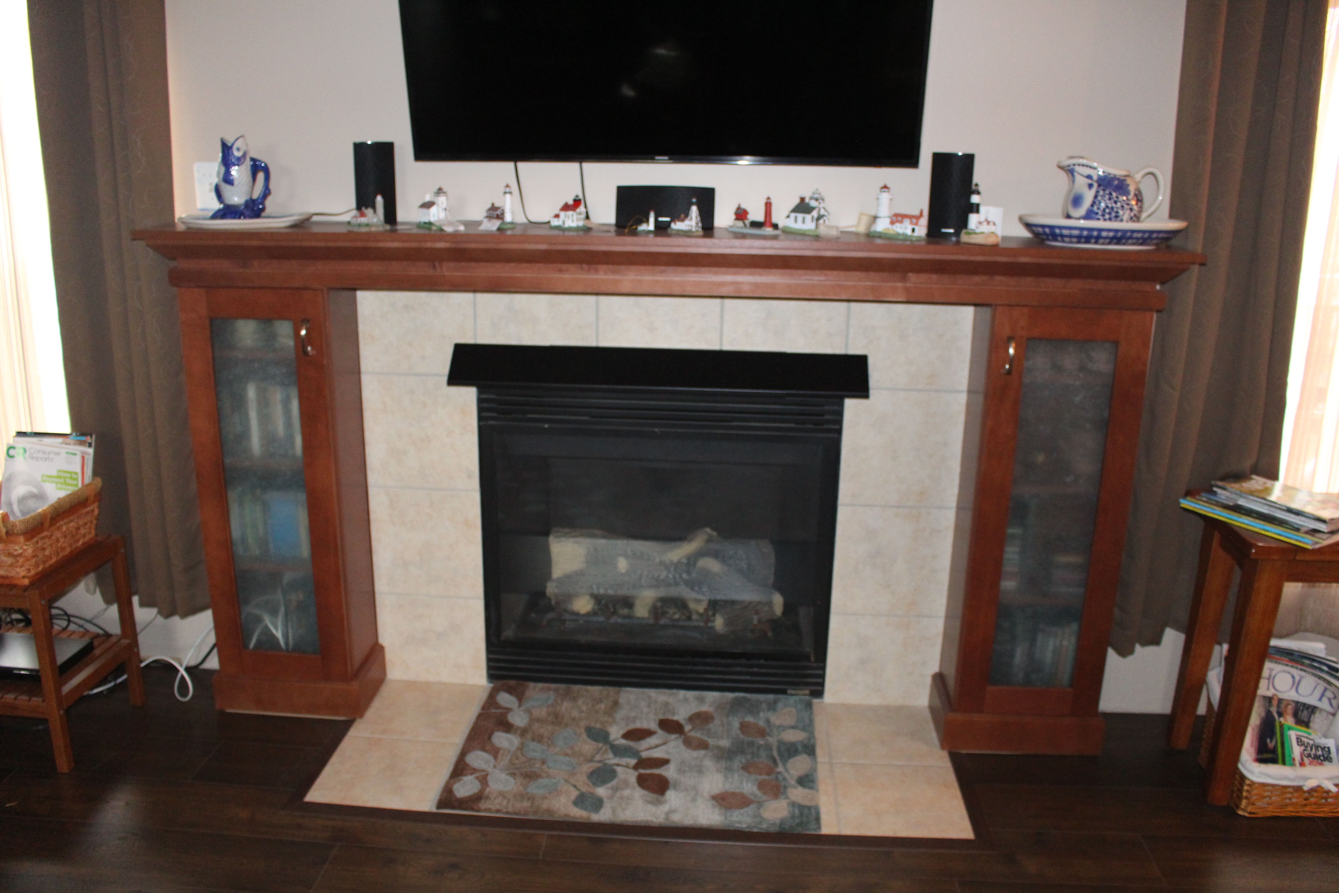 Remodeled fireplace surround with added storage that flanks dd0d5098a c2242f bdd