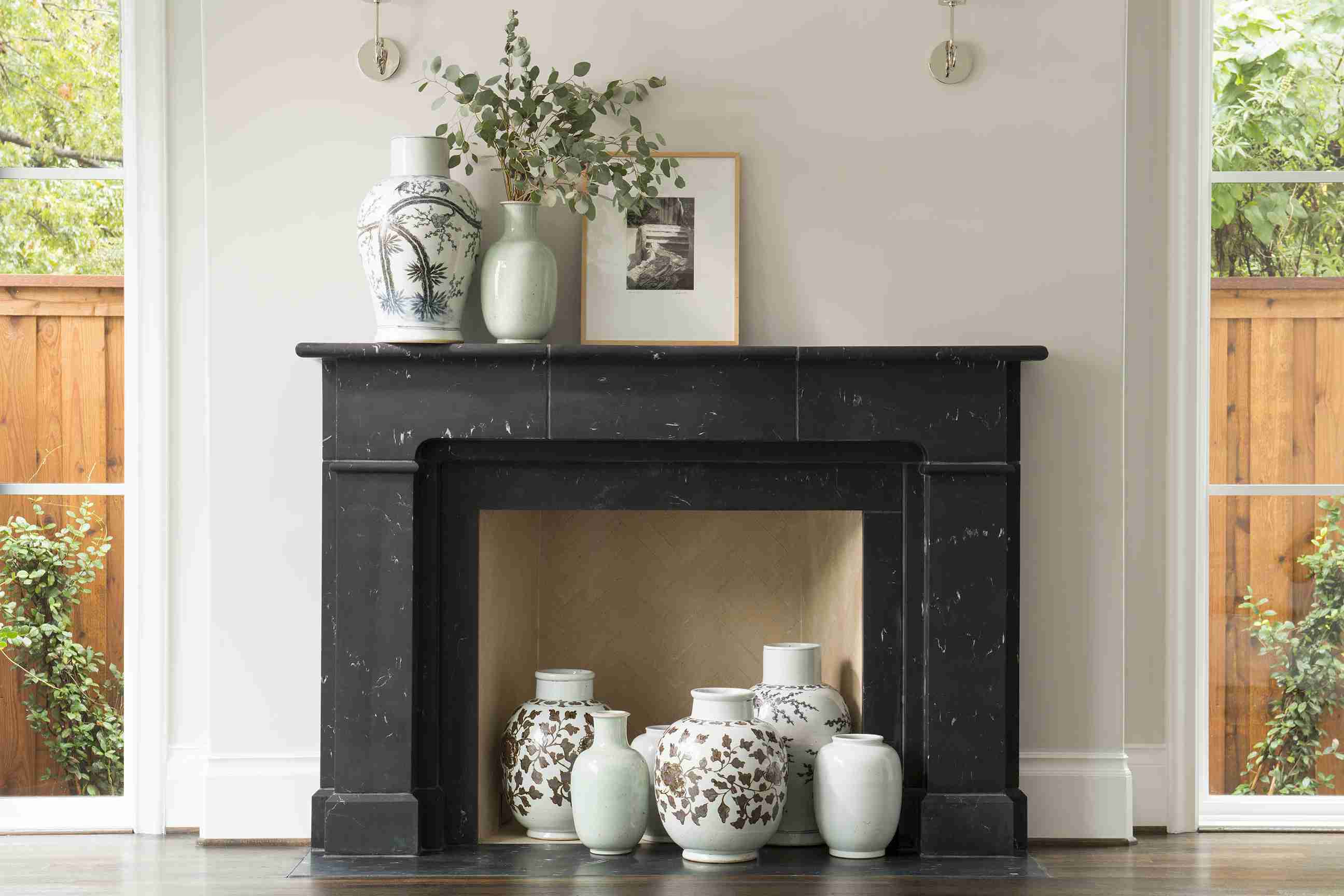 18 Stylish Mantel Ideas for Your Decorating Inspiration 12 fin black marble fireplace 5a0c9e069e b5