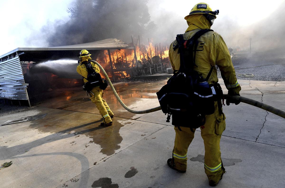 The Latest Residents describe fleeing Los Angeles fire 5da0022a7ce36age
