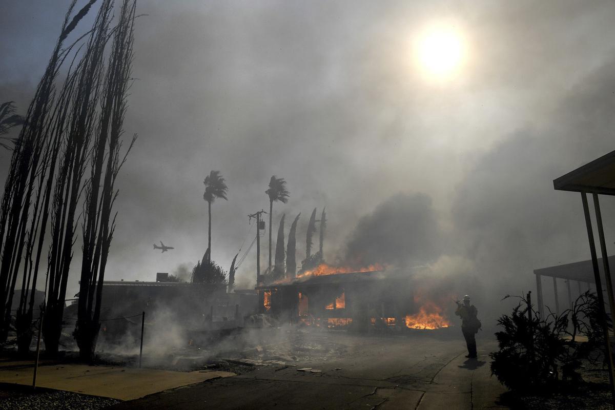 The Latest Residents describe fleeing Los Angeles fire 5da d42eage