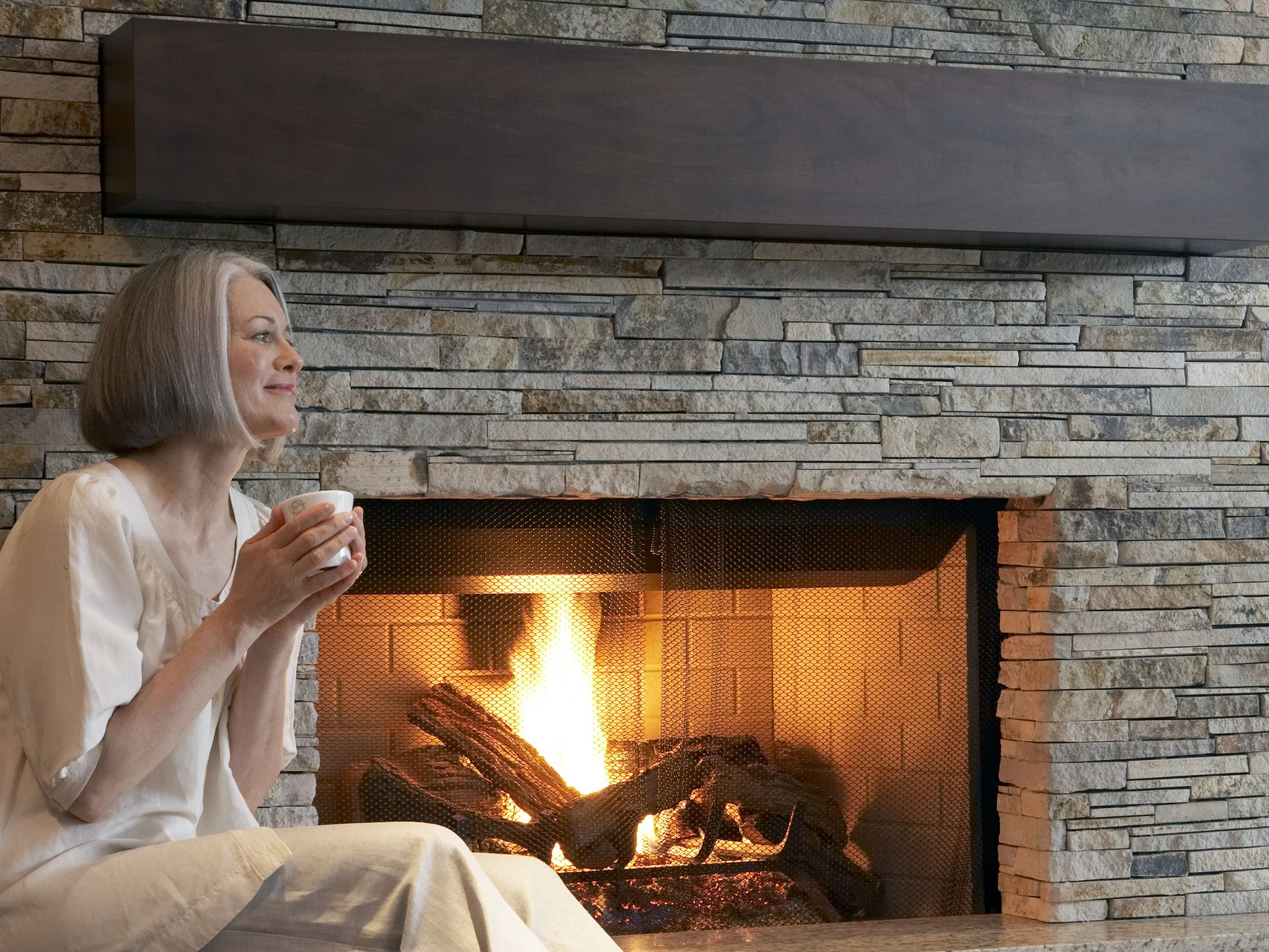Can You Install Stone Veneer Over Brick Stone fireplace Getty sb f 001 58c21eca3df78c353c1551ba