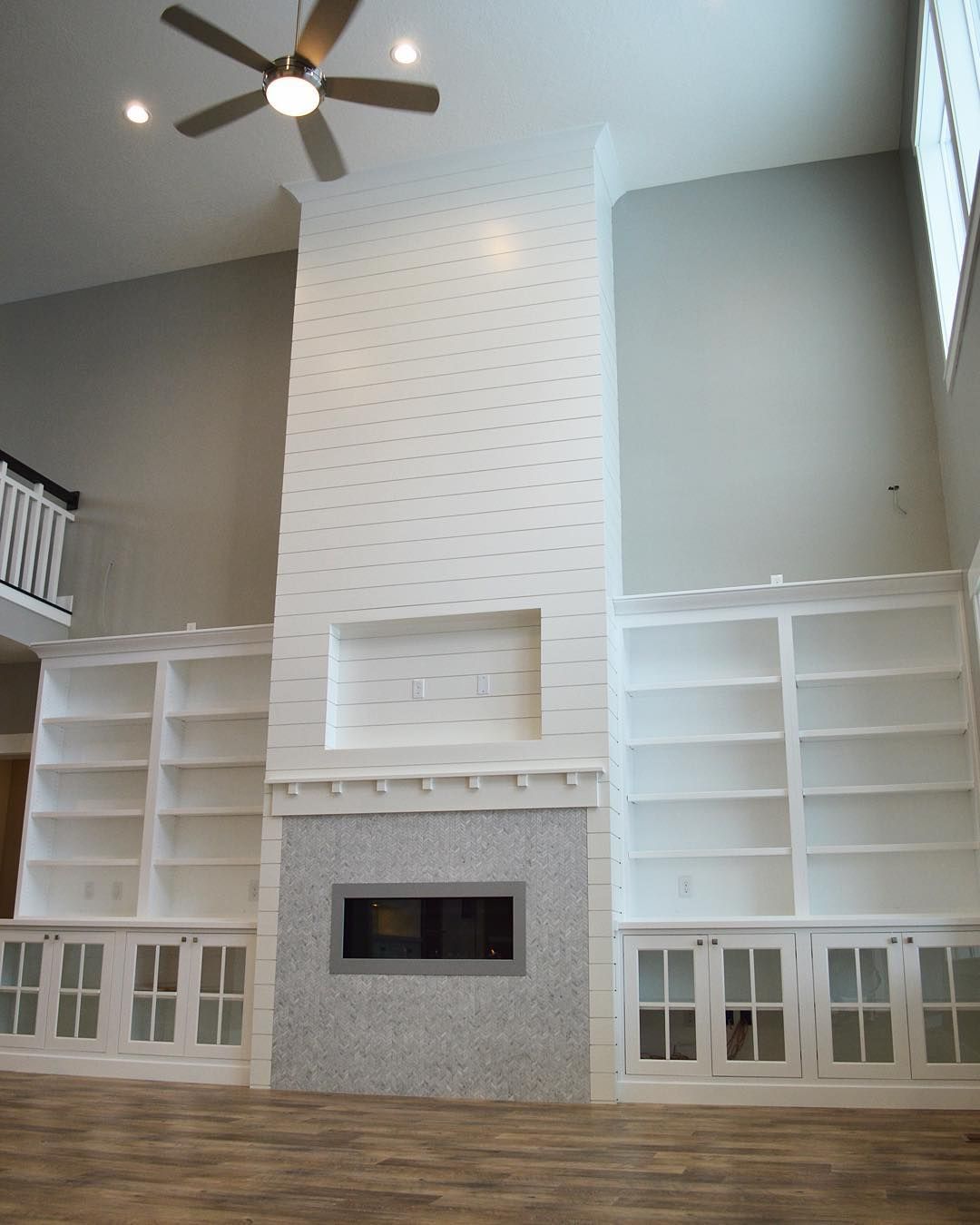 Dining room fireplace stone and shiplap with built ins 0d042aad2ee3ee7e4ce1fb2c7e789e71