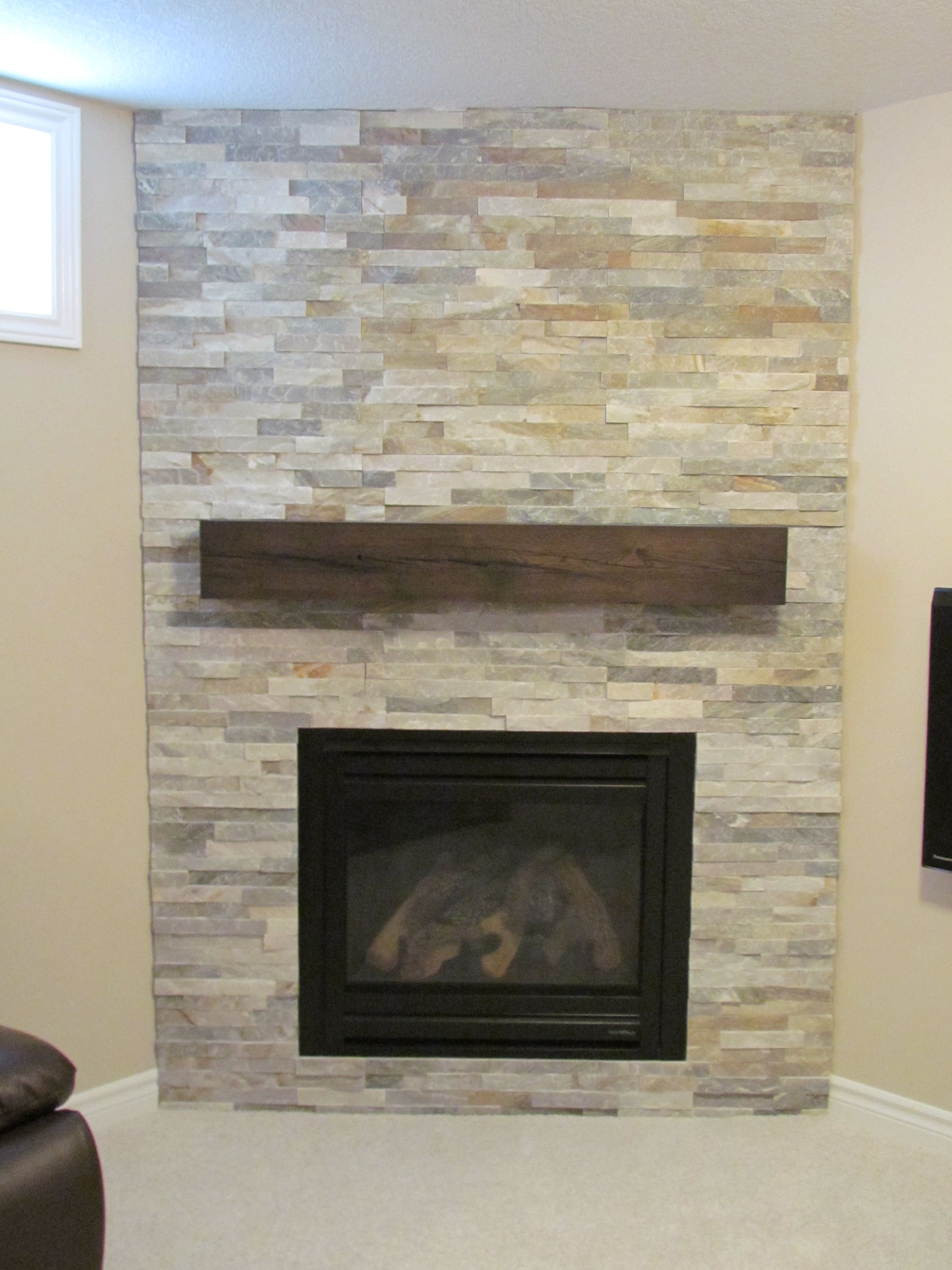 Ledge stone fireplace with rustic reclaimed wood mantel 58b53e ec29d561cea5ec