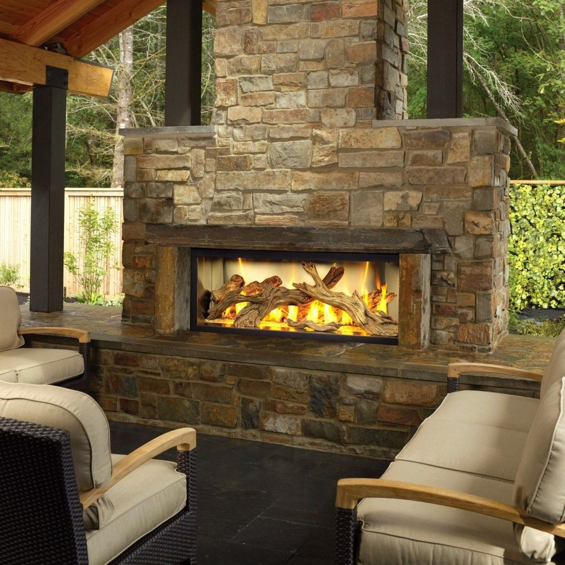 Two Sided Fireplace Indoor Outdoor Lovely Luxury Outdoor Chat area Massive Stone Faced Outdoor Gas
