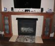 What is A Fireplace Hearth Beautiful Remodeled Fireplace Surround with Added Storage that Flanks